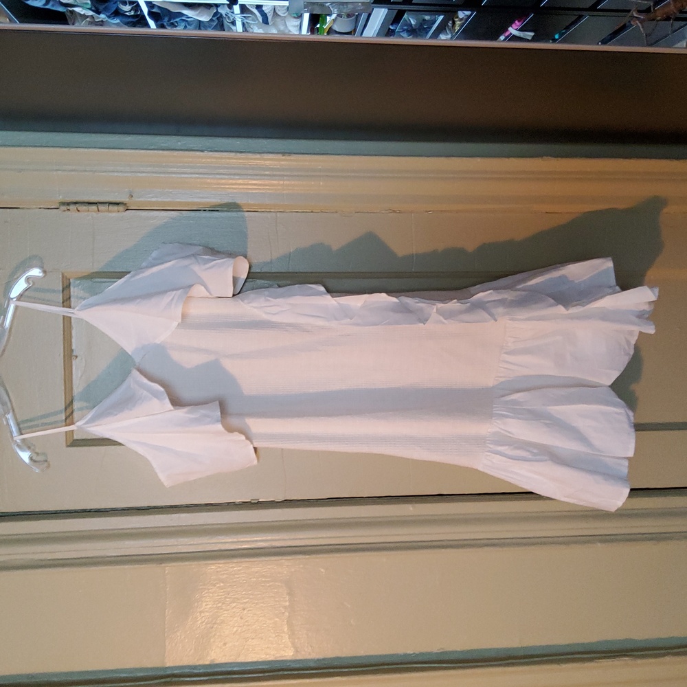 Thin strapped ruffled dress.